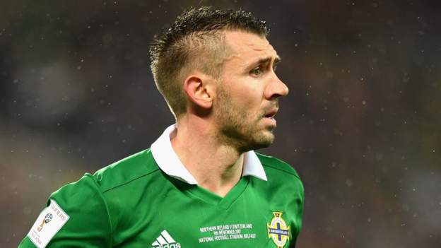 Gareth McAuley: Retired NI defender says he would have been playing on 'for the wrong reasons' - BBC Sport